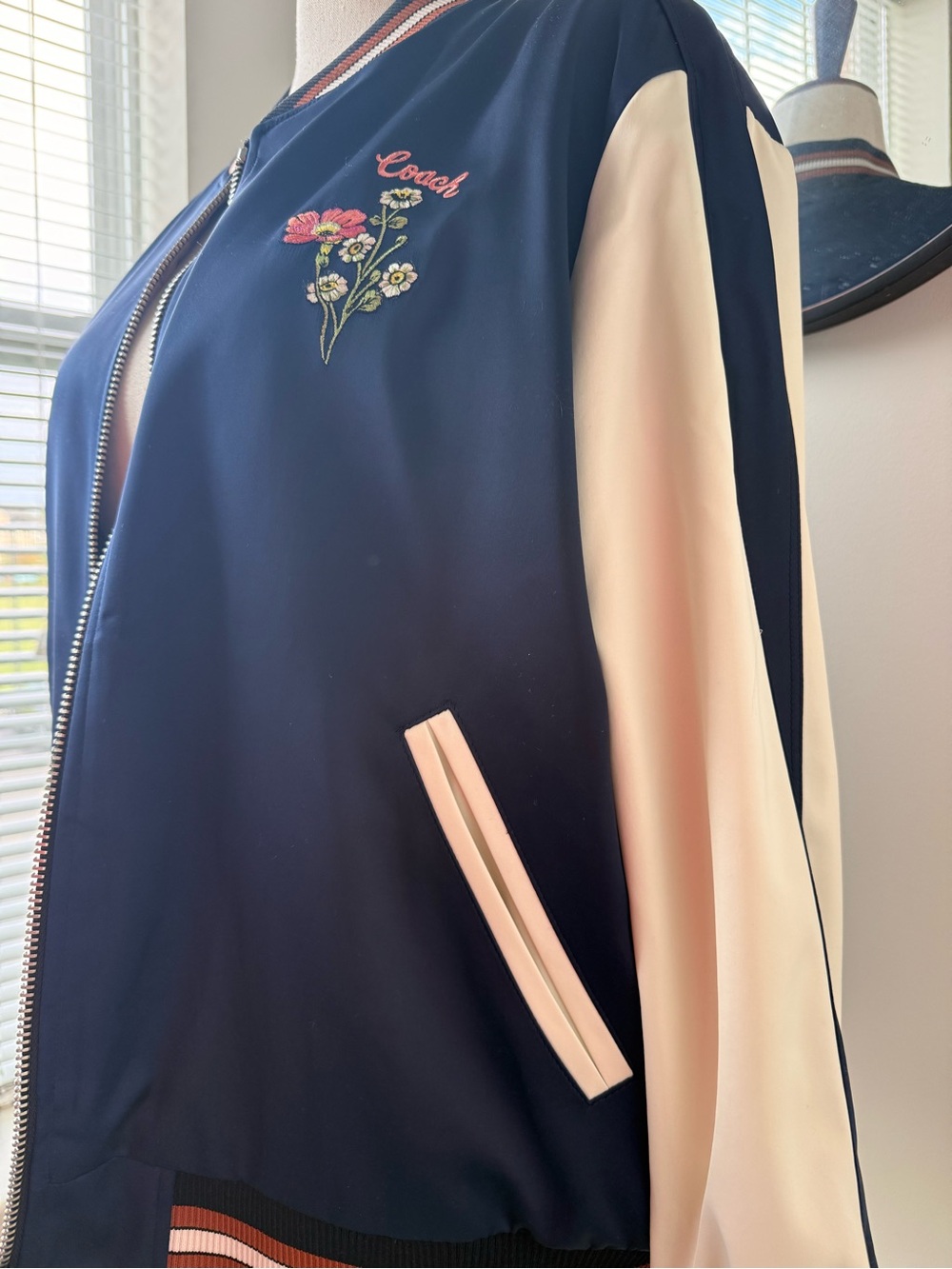 Coach Reversible Navy Bomber Jacket with Cream Sleeves and Floral Embroidery - Picture 7 of 11